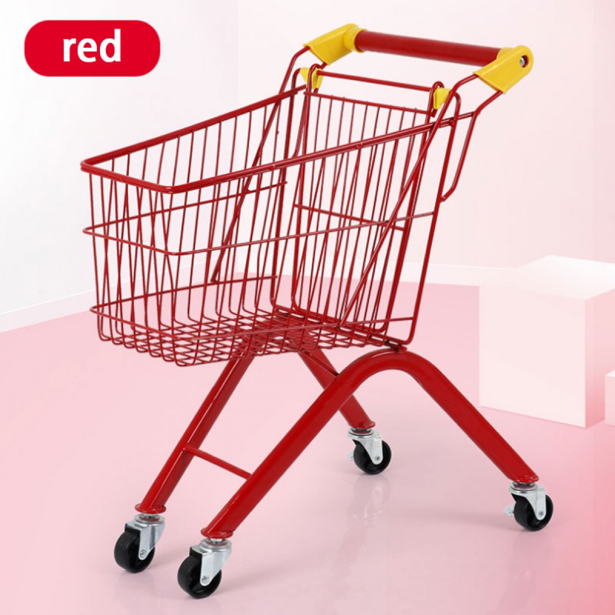Red metal shopping cart for children Red metal shopping cart for children