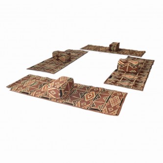 A set of travel and camping mattresses with four foldable mattresses, brown